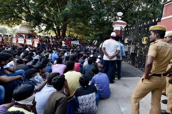 Recently, students of Anna University staged protest in front of their college for postponing of their semester examinations due to floods in Chennai on Sunday. Photo: AP 