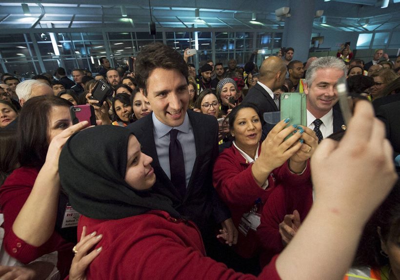 canada, refugee, syrian refugee, syrian refugee in canada, canada airport, toronto airport refugees, migrants, Syrian migrants, canada prime minister, PM of canada, Prime Minister Justin Trudeau, PM justin, justin and syria, airport refugees, canada PM photos,