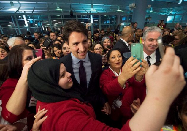 canada, refugee, syrian refugee, syrian refugee in canada, canada airport, toronto airport refugees, migrants, Syrian migrants, canada prime minister, PM of canada, Prime Minister Justin Trudeau, PM justin, justin and syria, airport refugees, canada PM photos,