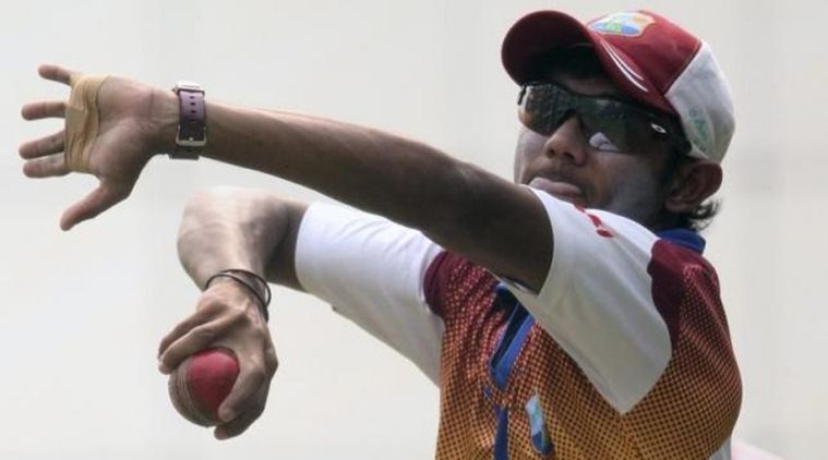 West Indies Devendra Bishoo bowls during a practice session in New Delhi November 4, 2011. REUTERS/Stringer/Files