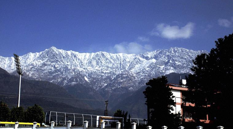 Dharamshala: View of snow capped dhauladhar range on Friday morning in Dharamshala, HP. PTI Photo(PTI11_27_2015_000217A)