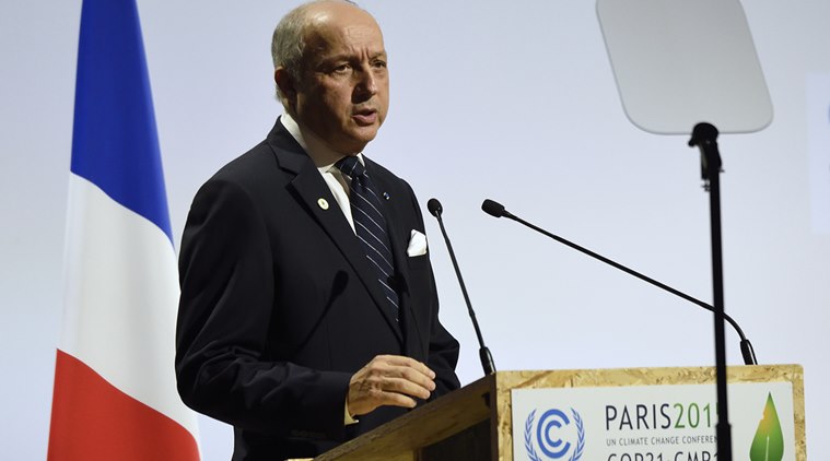 French Foreign Affairs Minister Laurent Fabius delivers a speech at the COP21, United Nations Climate Change Conference, in Le Bourget, outside Paris, Monday, Nov. 30, 2015. (Eric Feferberg/Pool Photo via AP)