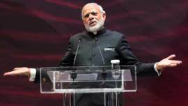 narendra modi, narendra modi govt, modi govt new year resolution, sangh parivar, modi foreign visits, Madison Square garden, RBI, RBI governor,
