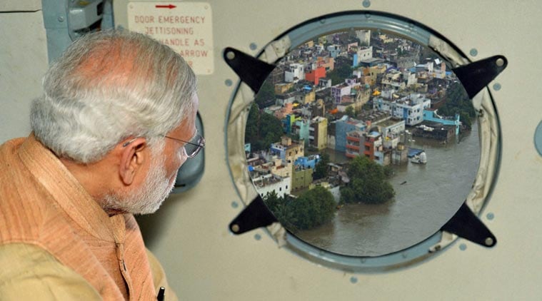 The doctored photo of Narendra Modi surveying the flood situation in Chennai, as released by PIB.