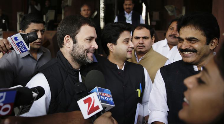 Indian Congress party vice president Rahul Gandhi, left, with his party colleagues leaves after attending parliamentary party meeting, at the parliament house, in New Delhi, India, Friday, 27 Nov. 2015. (AP Photo/ Manish Swarup)