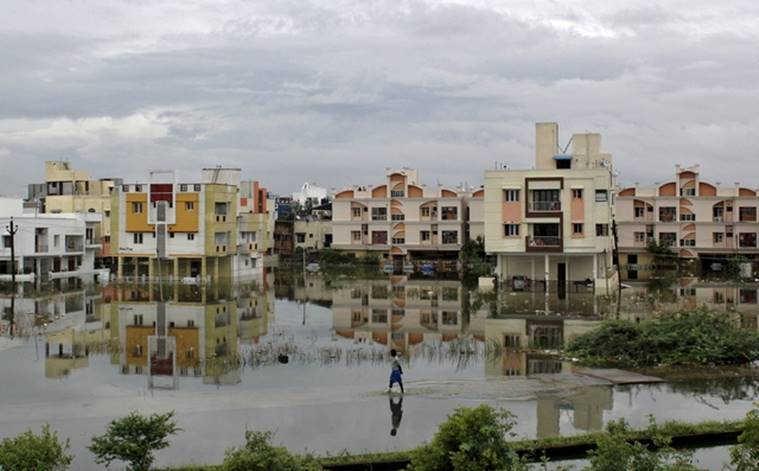 The heaviest rainfall in over a century caused massive flooding across the Indian state of Tamil Nadu, driving thousands from their homes, shutting auto factories and paralysing the airport in Chennai. Reuters