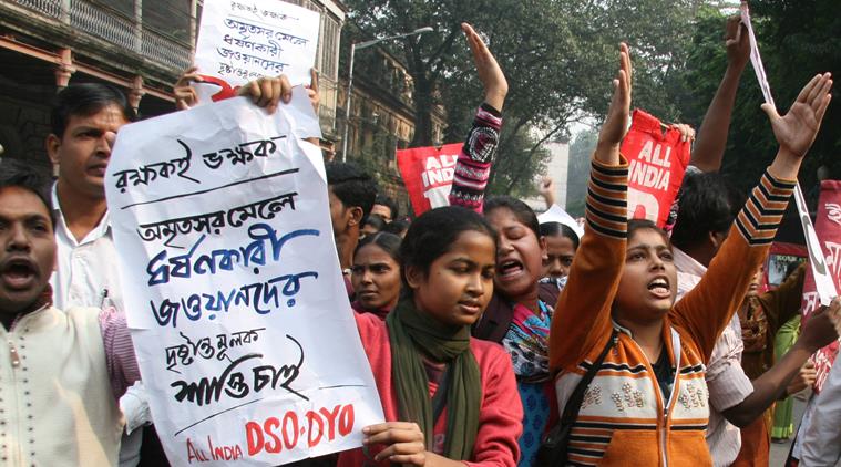 Members of AIDSO, AIDYO and AIMSS during a protest in front of Raj Bhavan, Kolkata on December 29, 2015 in connection with alleged gangrape of a teen age girl in Howrah-Amritsar mail by army jawans. (Source: Express photo by Partha Paul)