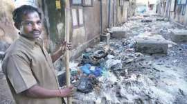 Chennai floods, sanitary workers, Chennai sanitary workers, Chennai clean up, Kotturpuram Housing Board Colony, nation news,