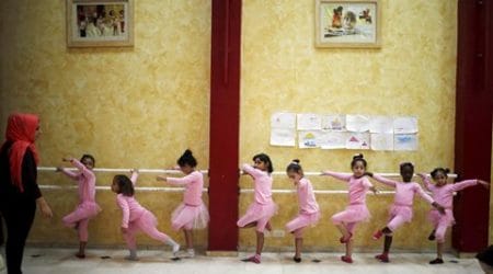 Palestinian girls take part in a ballet dancing course, run by the Al-Qattan Center for Children, in Gaza City November 25, 2015. Picture taken November 25, 2015. REUTERS/Suhaib Salem