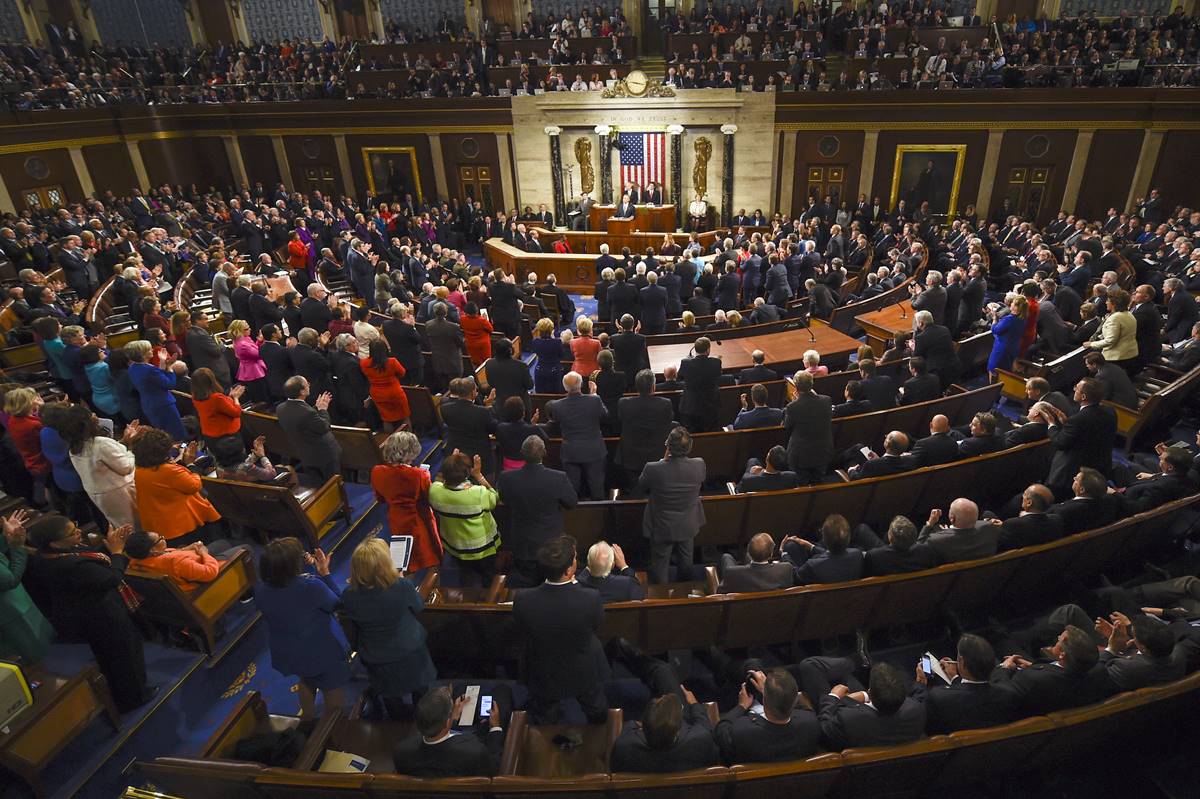 Obama is applauded as he gives his State of the Union address before a joint session of Congress on Capitol Hill in Washington. (AP Photo/Susan Walsh)