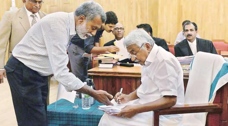 Chandy appears before the commission, Monday. (PTI Photo)