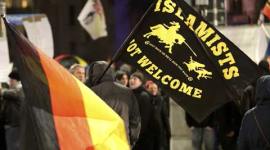 Angela Merkel, Merkel, Merkel migrants policy, Cologne, Cologne protests, Leipzig protests, Leipzig rallies, LEGIDA, LEGIDA germany, Germany migrants, Germany protests, Germany news, World news