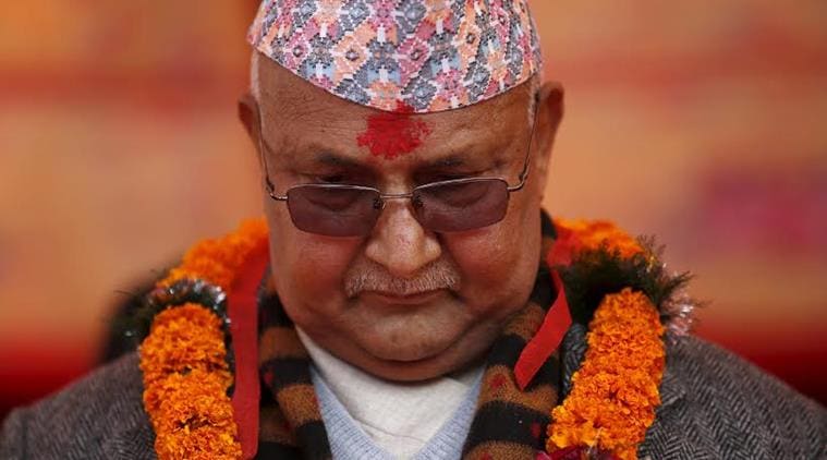 Nepal's Prime Minister Khadga Prasad Sharma Oli, also known as KP Oli, observes a minute of silence for earthquake victims during an event organised to mark the 18th National Earthquake Safety Day and the official launch of earthquake reconstruction efforts in Bungamati village, Nepal January 16, 2016. REUTERS/Navesh Chitrakar