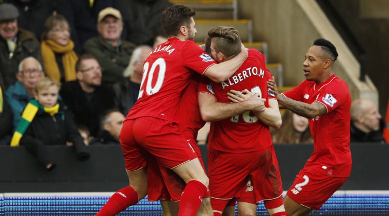 Liverpool win nine-goal thriller at Norwich; Leicester ...