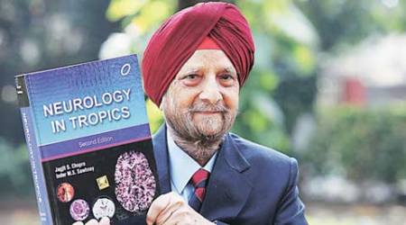 Dr Jagjit S Chopra with his book Neurology in Tropics in Chandigarh.  (Express Photo by Jaipal Singh)
