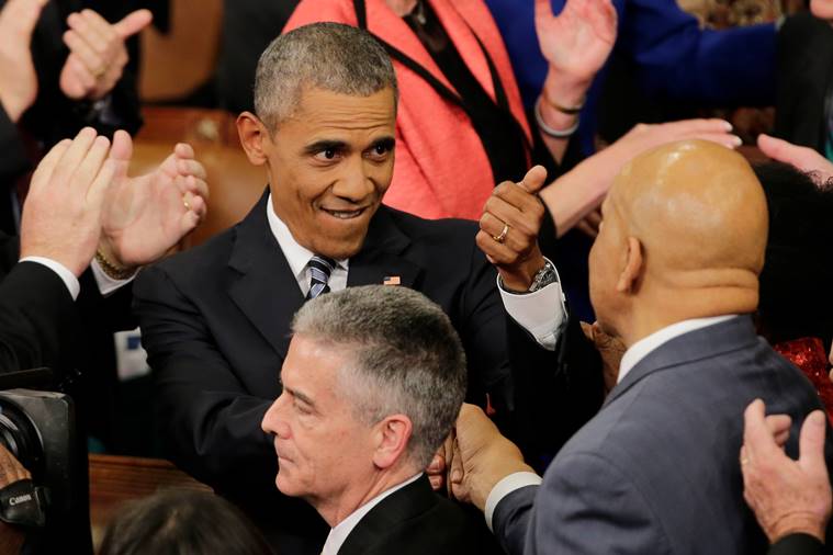 President Barack Obama gestures as he arrives on Capitol Hill in Washington, Tuesday, Jan. 12, 2016, before giving his State of the Union address before a joint session of Congress. (AP Photo/J. Scott Applewhite)