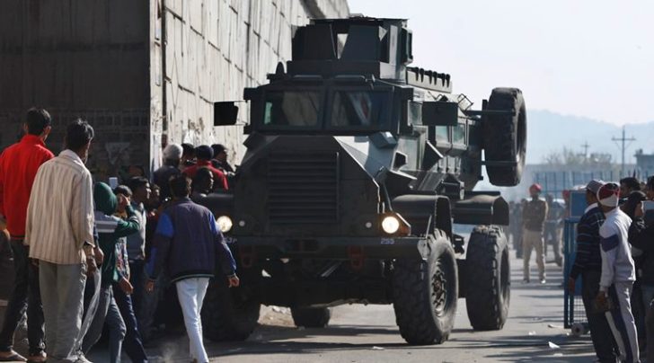 Pathankot attack: An armored vehicle moves near the air force base in Pathankot in Punjab (AP Photo/Channi Anand)