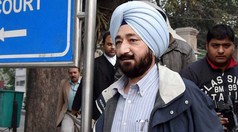 Superintendent of Police Salwinder Singh comes out of the Patiala House court in New Delhi on Monday. PTI Photo
