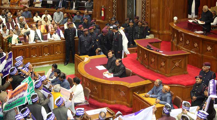 BSP, Congress and RLD MLAs protest during the Governor’s address in the UP Assembly Friday. (Express Photo by Vishal Srivastav)