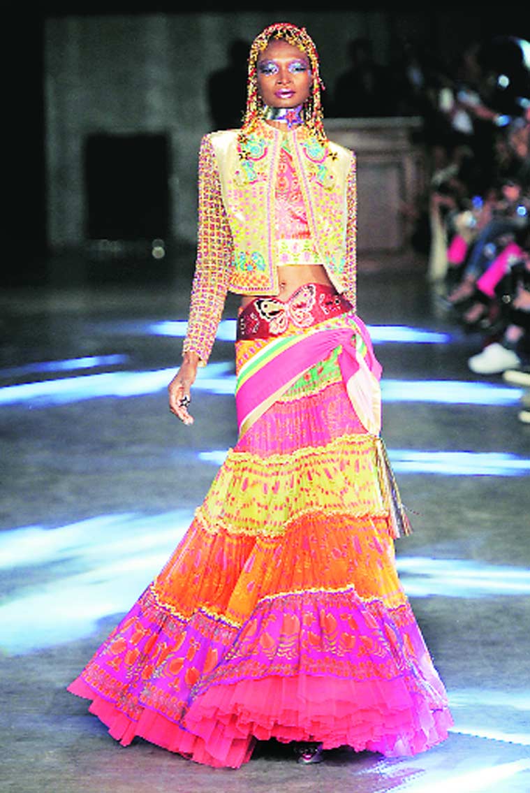 Manish Arora with Ambassador of France Francois Richier (above); a model in Arora’s latest Spring-Summer 2016 line showcased at Paris Fashion Week in October, 2015