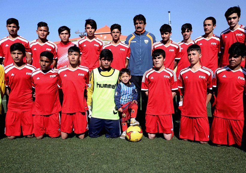 5-year-old Afghan soccer fan with makeshift Lionel Messi jersey