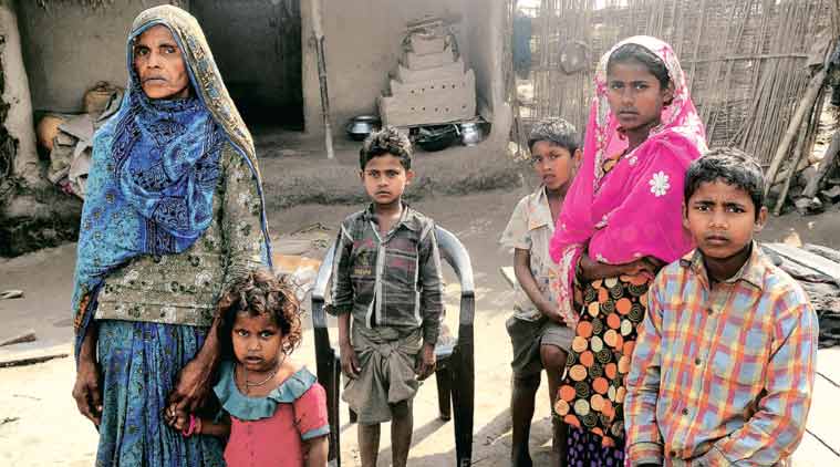 Rukhsana Khatoon, wife of Mohd Shagir, and her children at Gokhlapur in Araria district. (Express Photo Prashant Ravi)