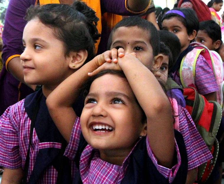 Educational Academic Year, Teachers welcoming School children's First day of the School at Thane on Monday. Express Photo by Deepak Joshi. 15.06.2015. Mumbai.