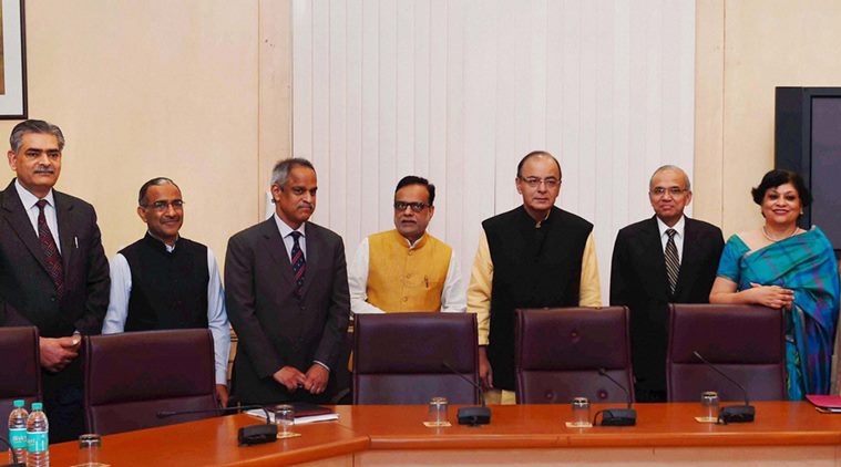 New Delhi: Union Minister for Finance, Corporate Affairs and Information & Broadcasting, Arun Jaitley pose with group photo with the members of the Economic Division who assisted in the preparation of Economic Survey, in New Delhi on Thursday.PTI Photo by Shahbaz Khan(PTI2_25_2016_000031b)