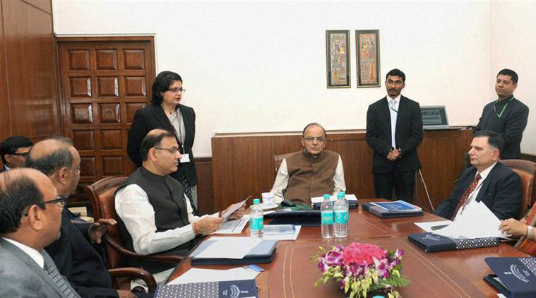 New Delhi: Union Minister for Finance, Corporate Affairs and Information & Broadcasting, Arun Jaitley inaugurates the Non Tax Receipt Portal (NTR portal), developed by Controller General of Accounts, in New Delhi on Monday. Minister of State for Finance, Jayant Sinha and the Finance Secretary,  Ratan P. Watal and other dignitaries are also seen. PTI Photo   (PTI2_15_2016_000305B)