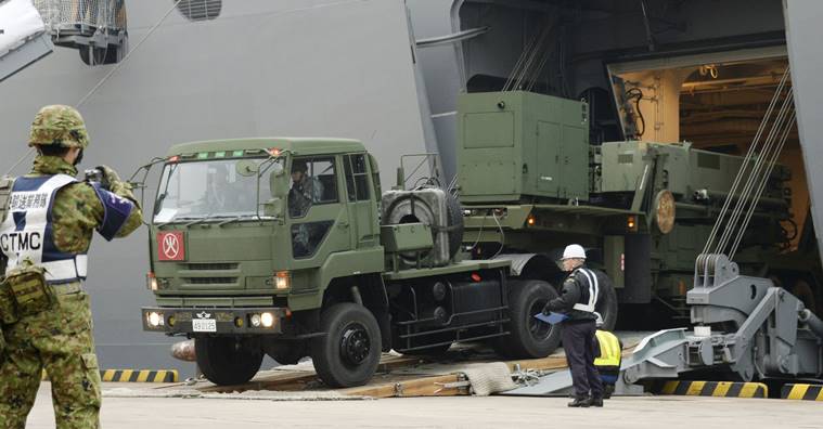 A vehicle carrying a PAC-3 missile interceptor arrives at a port on Ishigaki Island, Okinawa prefecture, southwestern Japan. AP Photo