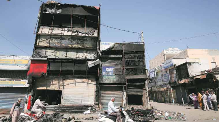 Selective burning Jat-owned Haryana Book Depot spared, shops on either side set ablaze, in Jhajjar. Ravi Kanojia