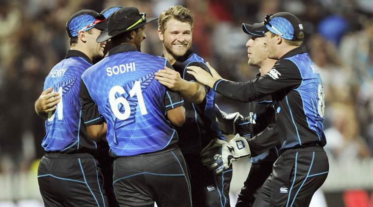 New Zealands Corey Anderson, center, celebrates with his teammates after dismissing Australias John Hastings for 6 in the 3rd One Day International Cricket match at Seddon Park in Hamilton, New Zealand, Monday, Feb. 8, 2016. (Ross Setford/SNPA via AP) NEW ZEALAND OUT
