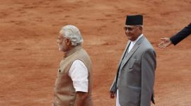 Nepal’s Prime Minister Oli and his Indian counterpart Modi walk during his ceremonial reception at the forecourt of India’s Rashtrapati Bhavan presidential palace in New Delhi no alt set
