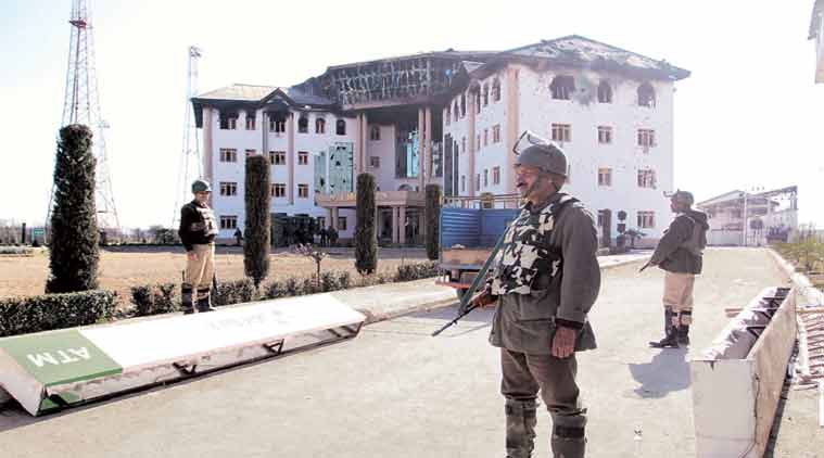 Security personnel at the EDI campus at Pampore on Tuesday. (Express Photo: Shuaib Masoodi)