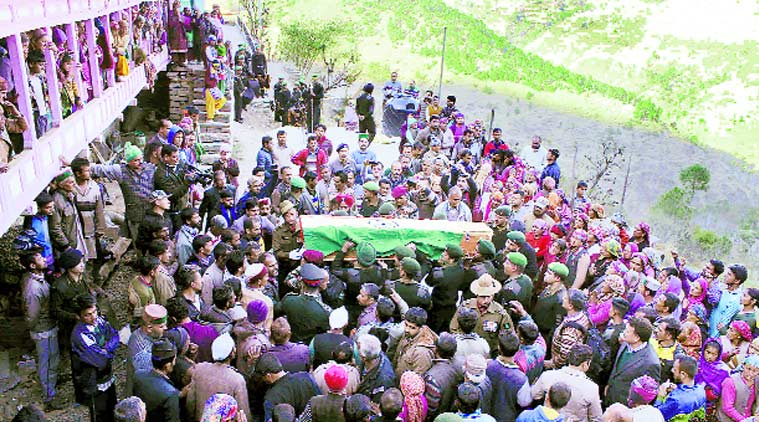 Army personnel and residents pay tribute to Lance Naik Om Prakash, who was killed in the Pampore attack, at Chikhar village near Shimla on Monday. Lalit Kumar