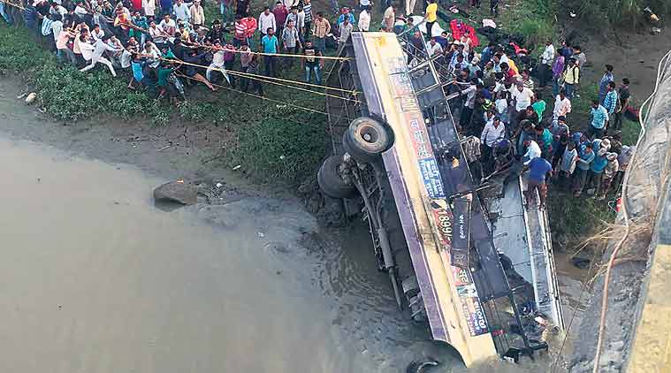 Two girls — identified as Neha Halpati (22) and Jamna Valvi (22) — were among those dead in the accident. (Express Photo)