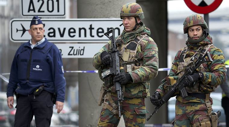 Belgian troops and police control a road leading to Zaventem airport following Tuesday's airport bombings in Brussels, Belgium, March 24, 2016. REUTERS/Charles Platiau