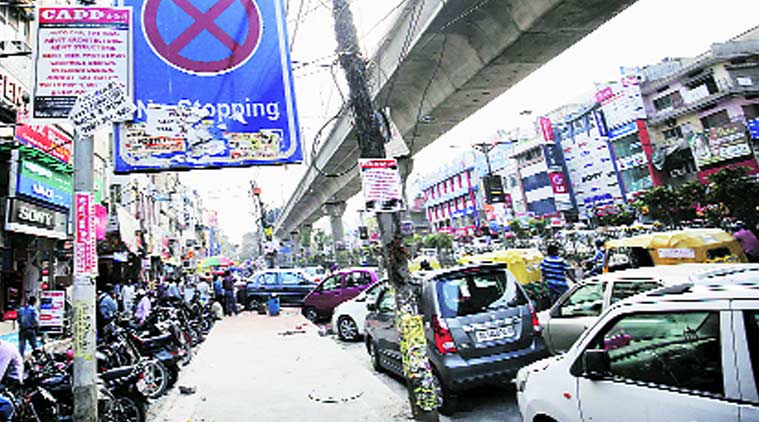 Cars parked in a no-parking area. Praveen Khanna