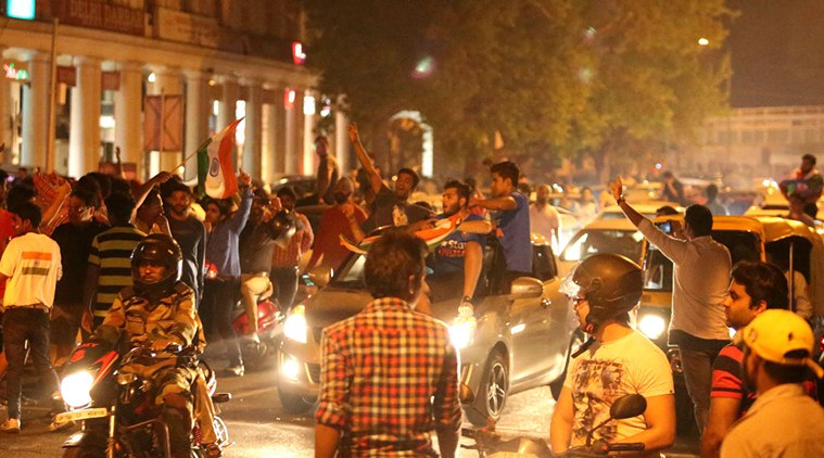 india pakistan fans, india fans celebrate, india pak win photos, india pakistan win pics, india pakistan cricket, india pakistan world t20, india pakistan crowd pics, india pakistan connaught place delhi, connaught place delhi cricket
