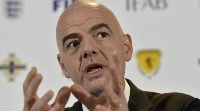 Newly elected FIFA President Gianni Infantino attends a news conference during the 130th Annual General Meeting of the International Football Association Board, in Cardiff, Britain