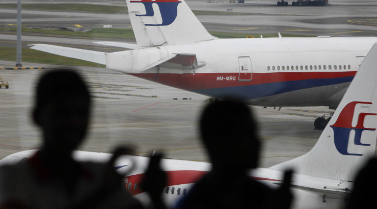 MH370, Malaysian Airlines flight 370, Aeroplane parts, plane parts Mozambique, Missing flight, MH370 pieces, MH370 parts, Liow Tiong Laow, Malaysian Transport minister, World news