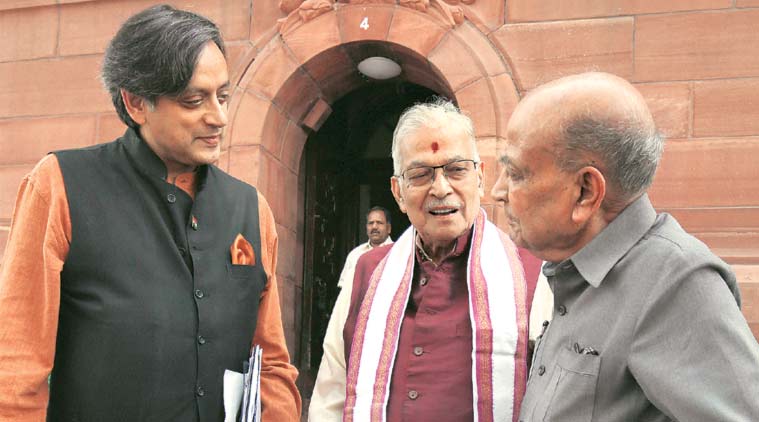 Congress MP Shashi Taroor and BJP MP Murli Manohar Joshi at Parliament on Friday. (Express Photo: Renuka Puri)