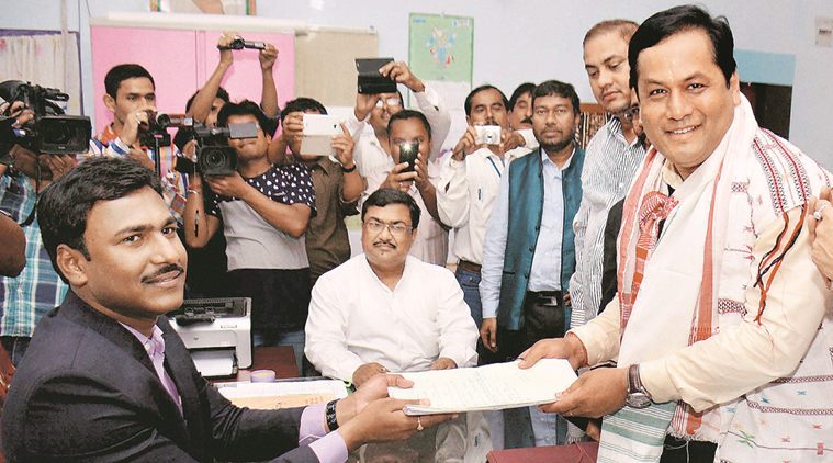 Majuli: BJP CM candidate & Union Minister for Youth and Sports Affairs and State President Sarbananda Sonowal filing his nomination papers at DC office ahead of Assam elections in Majuli on Wednesday. PTI Photo (PTI3_16_2016_000067B)