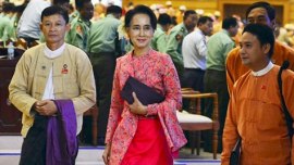 Aung San Suu Kyi, Suu Kyi, Myanmar government, Myanmar democracy, Myanmar democracy champion, Suu Kyi's National League for Democracy, NLD, Junta, Muslim Rohingya minority, Myanmar protests, world news