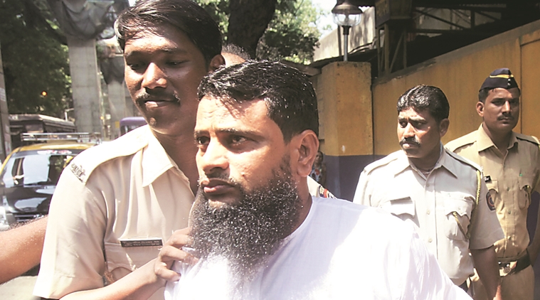 A convict in the 2002-03 serial bomb blast case being to the session Court from Arthur Road Jail in Mumbai on Wednesday Express Photo Mumbai 30/03/2016