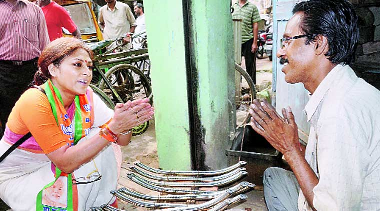 BJP candidate from Howrah North, Rupa Ganguly, campaigns in her constituency on Monday. PTI