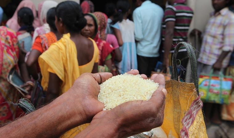 Villagers queue up at a ration shop in Lalgarh for rice at Rs 2 a kg. Partha Paul