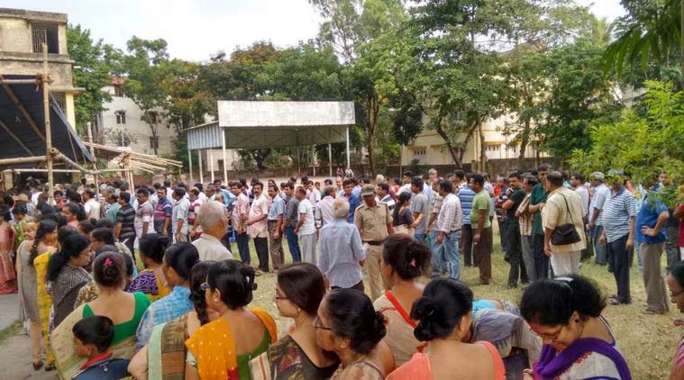 Voters and security at a Booth in Salt lake. (Source: Express photo by Partha Paul)