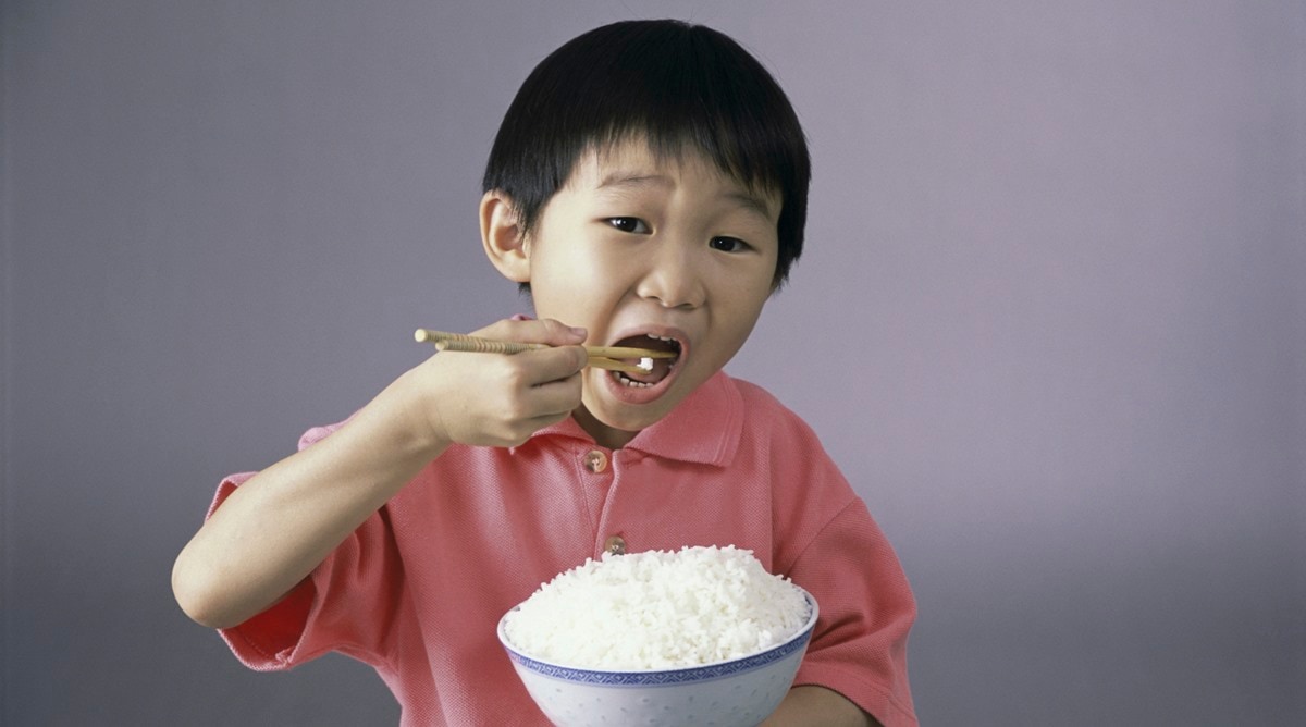 Baby store eating rice