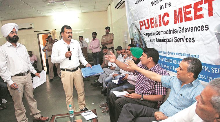 Residents of Manimjara and MC officers during public grievances meeting at community centre at Modren housing complex, Manimajra in Chandigarh on Monday, April 18 2016. Express photo by Jaipal Singh